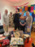 Left to right, Jerry Jones, Raija Hilska, Trygve Ringereide, Hilde Huus, and Angie MacCrae with a few items from Koti 28 (photo by Marian McLennan)