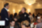 3 Sergeant Nunez Shakes had with Emceee Brad Garett.JPG