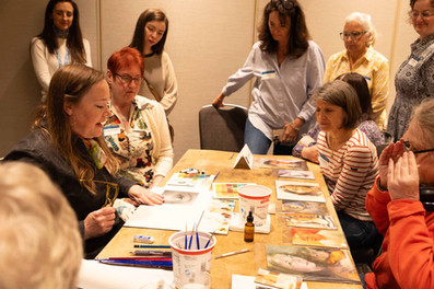 Ali Cavanaugh led a hands-on pre-conference workshop on painting watercolor portraits with 6 colors.