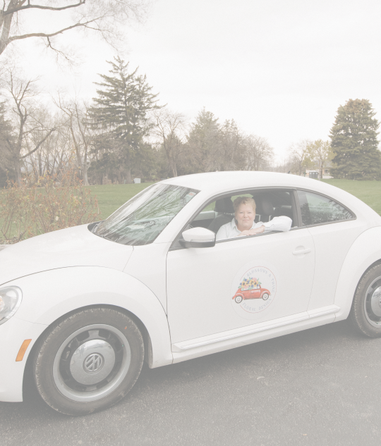white bug car with nickee from blossoms and twine