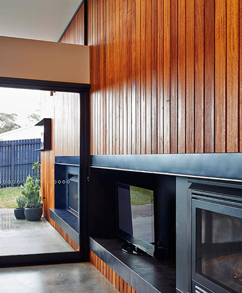 Custom-built Ocean Grove home with timber cladding and built-in fireplace