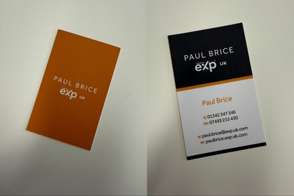 Paul Brice's previous business cards that were missing his job title of "Estate Agent"