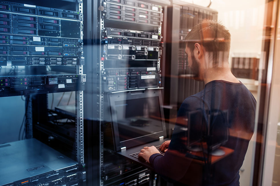 Man working in a server room
