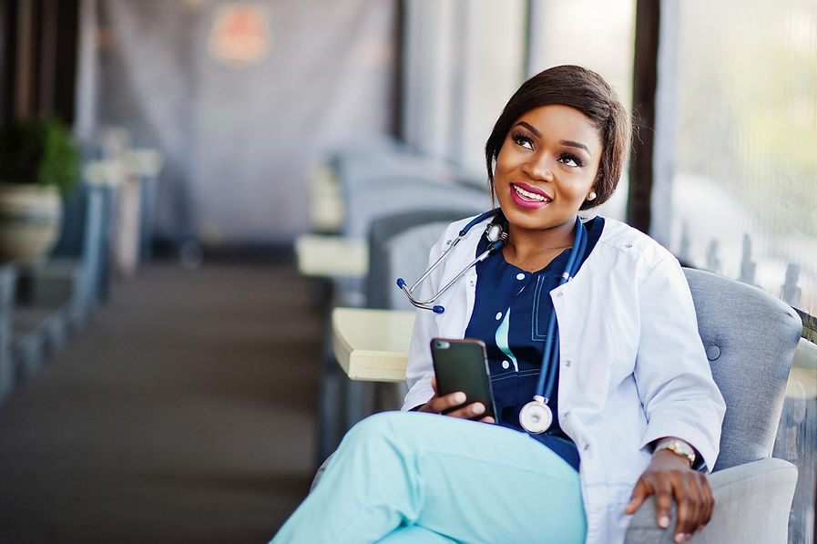 african-american-doctor-female-with-stethoscope-looked-phone-sitting-clinic_627829-3433.jp