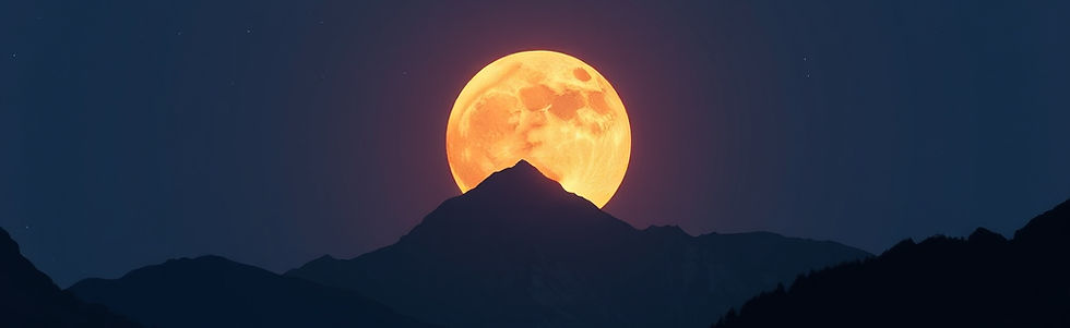 Large orange moon rising over dark mountains
