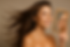 Female model with glowing skin representing medical aesthetics results