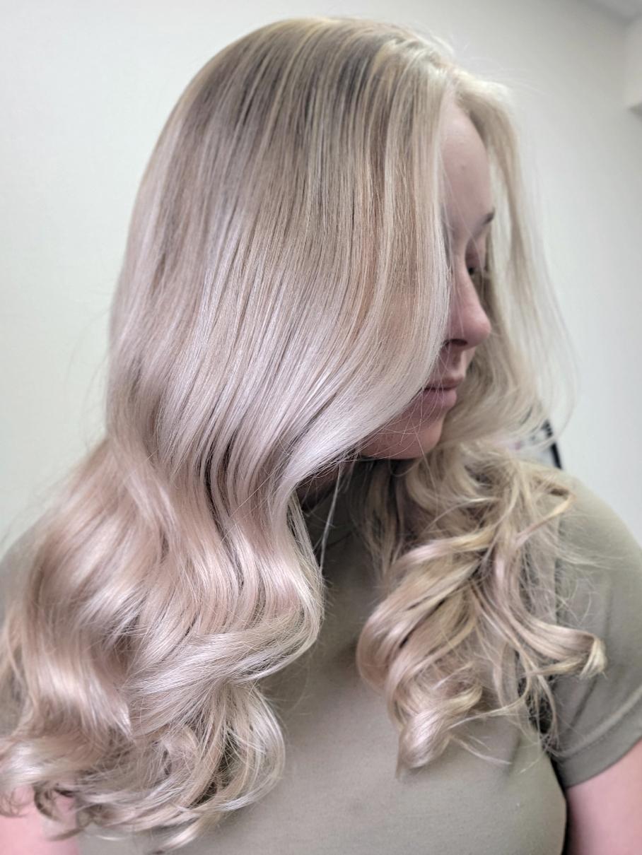 Client at Flaired Beauty with low-maintenance blonde hair