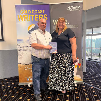 Award ceremony: Gold Coast Writers, author receives book award