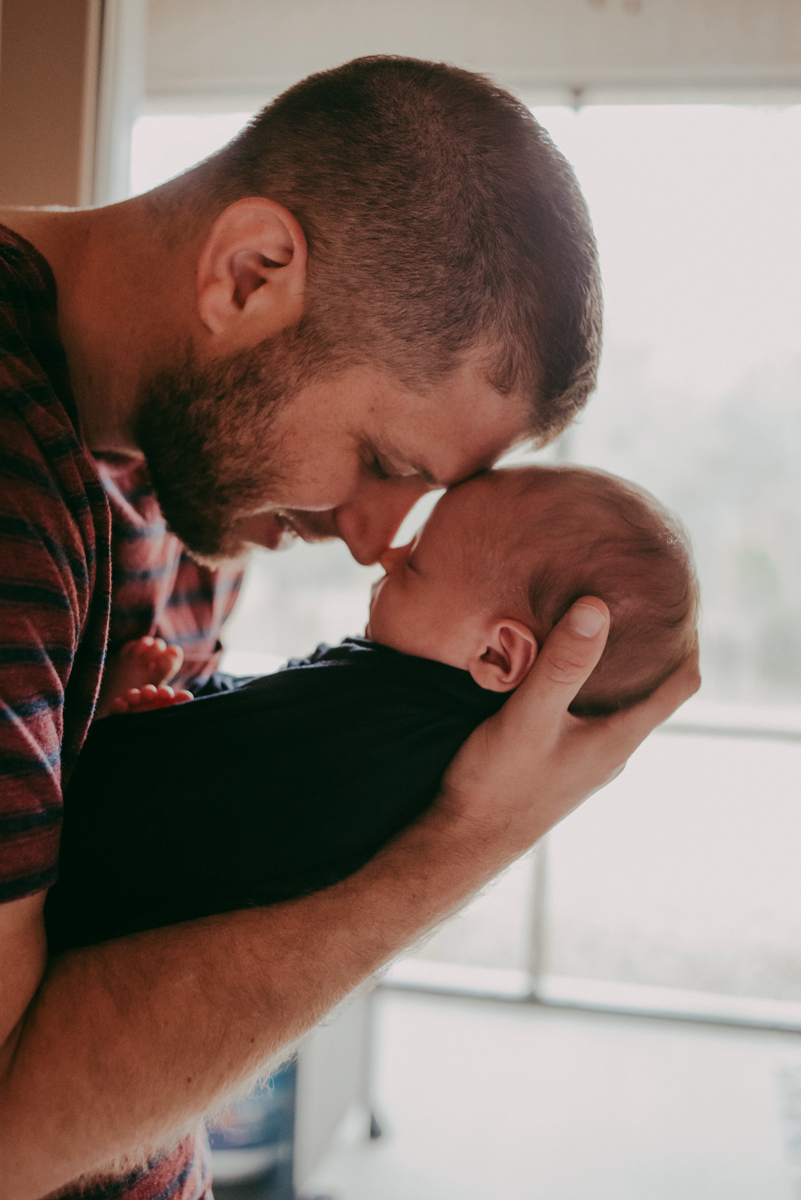 in home newborn photographers near me