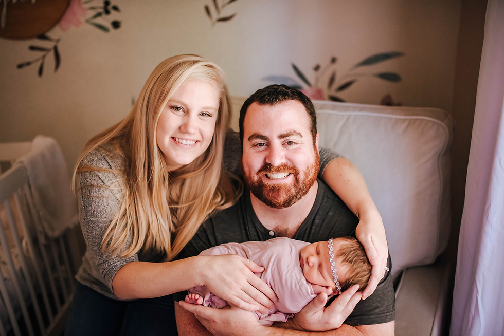 mom, dad and newborn baby