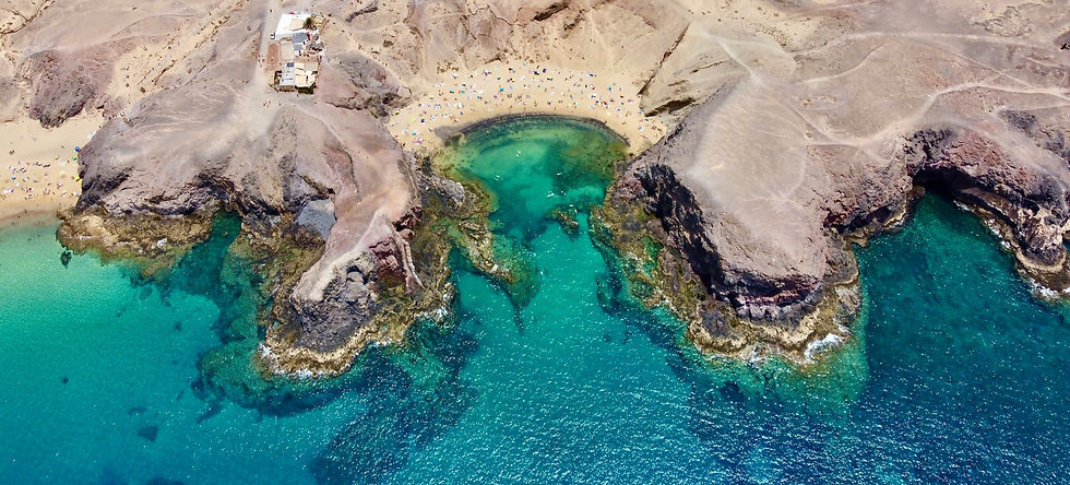 The volcanic landscapes of the Canary Islands form picturesque coves.
