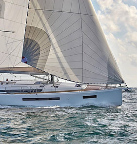A sleek sailing yacht gliding gracefully through the Baltic Sea, ideal for an unforgettable sailing adventure