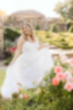 Bride twirling in her wedding gown Fort Worth Botanic Garden