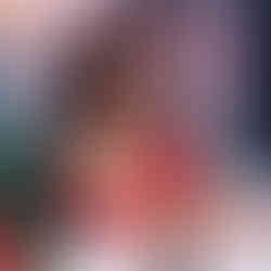 senior girl posed at legacy west wearing a red top