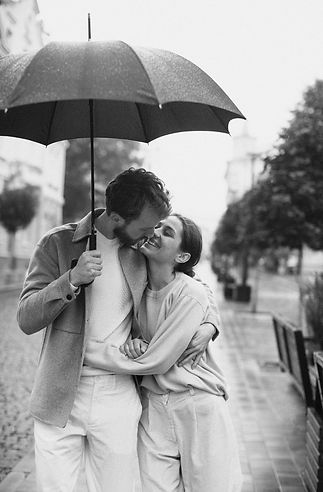 front-view-couple-walking-rain.jpg