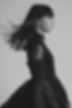 Monochromatic Portrait of Woman with Flowing Hair.png