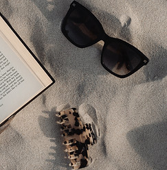 kaboompics_book-sunglasses-claw-clip-33005.jpg