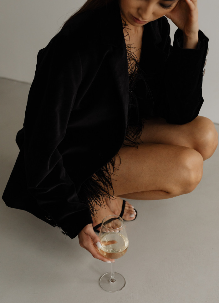 kaboompics_classy-aesthetics-beautiful-asian-woman-in-black-evening-dress-white-wine-in-a-