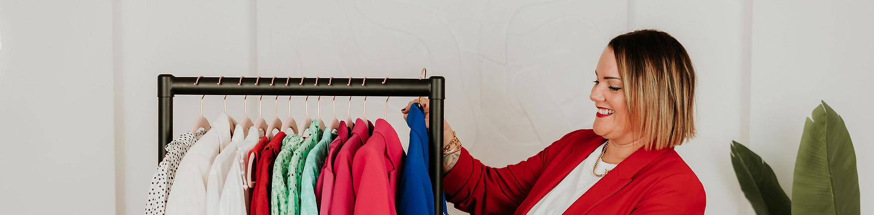 Jen looking through a clothes rail