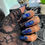 Thumbnail: Midnight blue rhinestones on square press-on nails on a hand
