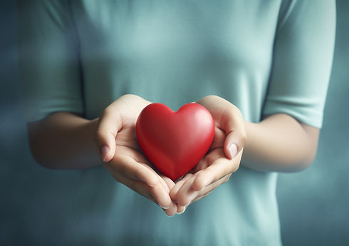 woman-holding-heart-shaped-object.jpg