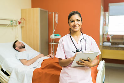 confident-female-doctor-with-reports-clipboard-standing-against-male-patient-hospital (1).