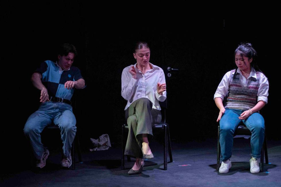 A production photo of the cast being attacked by flying ant