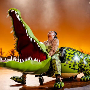 A production photo of the enormous crocodile puppet