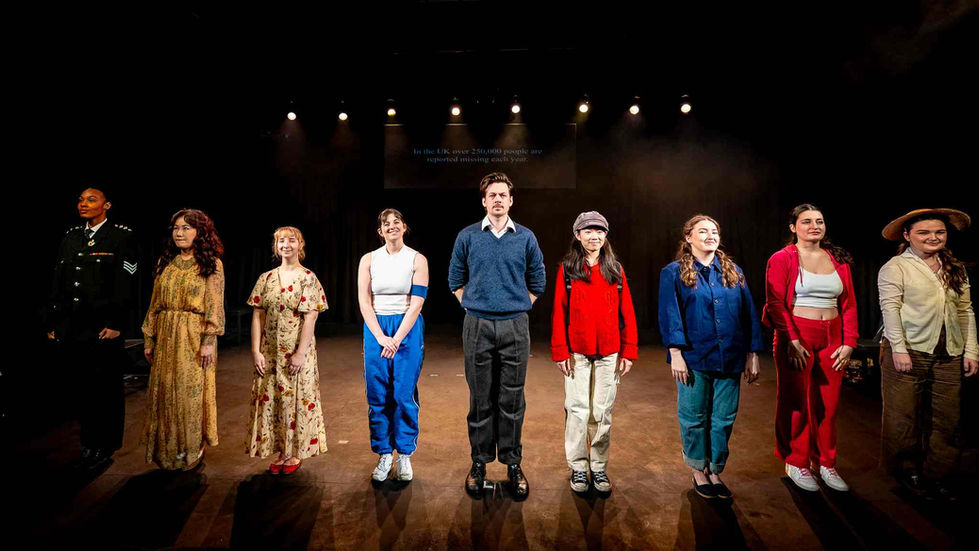 A production photo of the cast at the end of the show