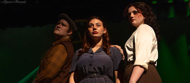 A photo of a man and two women in the production of Radium Girls at Walters State Community College, Morristown, Tennessee 2025