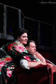 A photo of a man and woman in the production of Sweeney Todd The Demon Barber of Fleet Street at Encore Theatrical Company, Morristown, Tennessee 2025