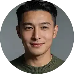 Smiling man in a green sweater