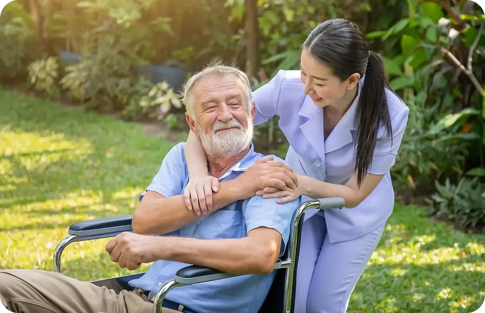 Smiling elderly man with caregiver in park