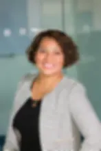 Smiling woman in striped jacket