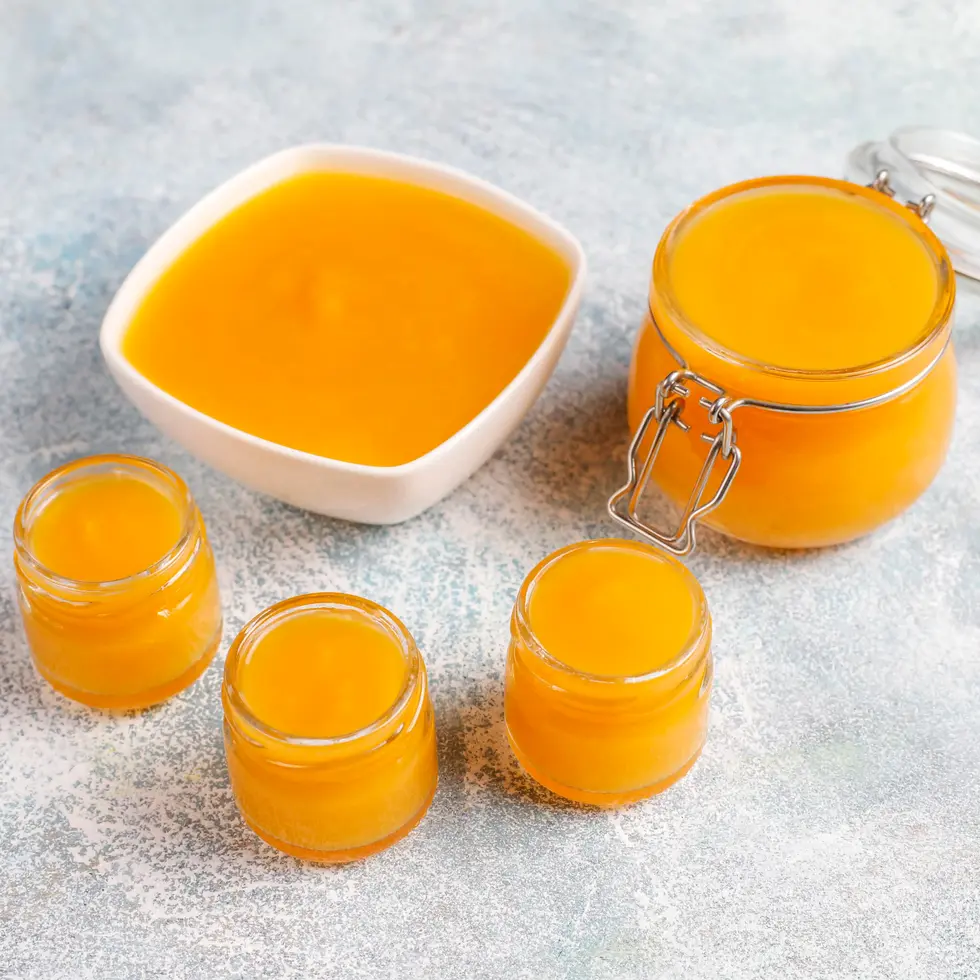 Delicious mango puree in various containers