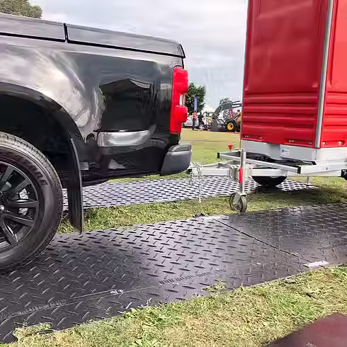track mat car and trailer.avif