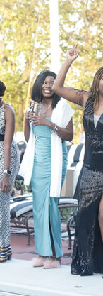 Wedding party dancing together during the reception celebration, photographed in a documentary wedding photography style that captures movement and joy.