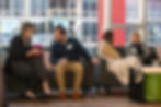Legal professionals networking on lounge couches inside Vu Rooftop during the In-House Connect mixer in Chicago’s South Loop.