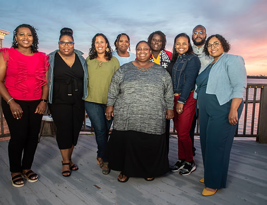 Group portrait during a Chicago networking event at sunset, captured by Walking Visions Photography Inc.—celebrating community, connection, and success.
