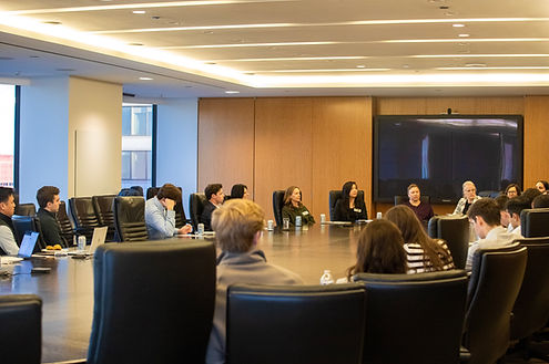 Attendees participating in the PEAC MBA Forum conference panel at 70 W. Madison St. in downtown Chicago.