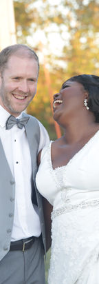 Intimate candid moment of the bride and groom during their wedding day, captured with documentary wedding photography that focuses on connection and emotion.