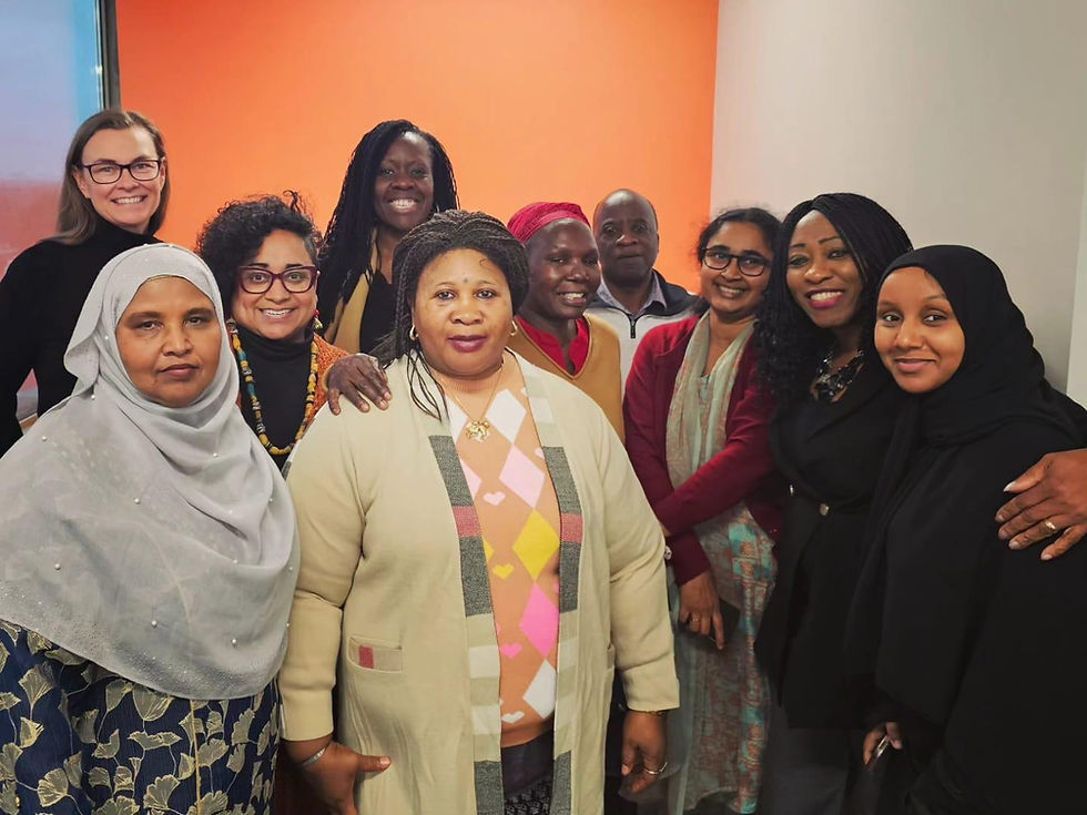 A group of women at a ROSCA Network organization meeting.