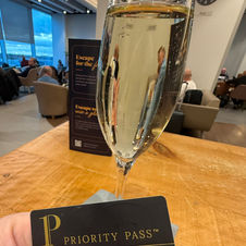 Airport Lounge, Priority Pass card & glass of Fizz