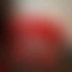 Bedroom at Radisson RED Gatwick Airport showing bed, desk and flat screen TV