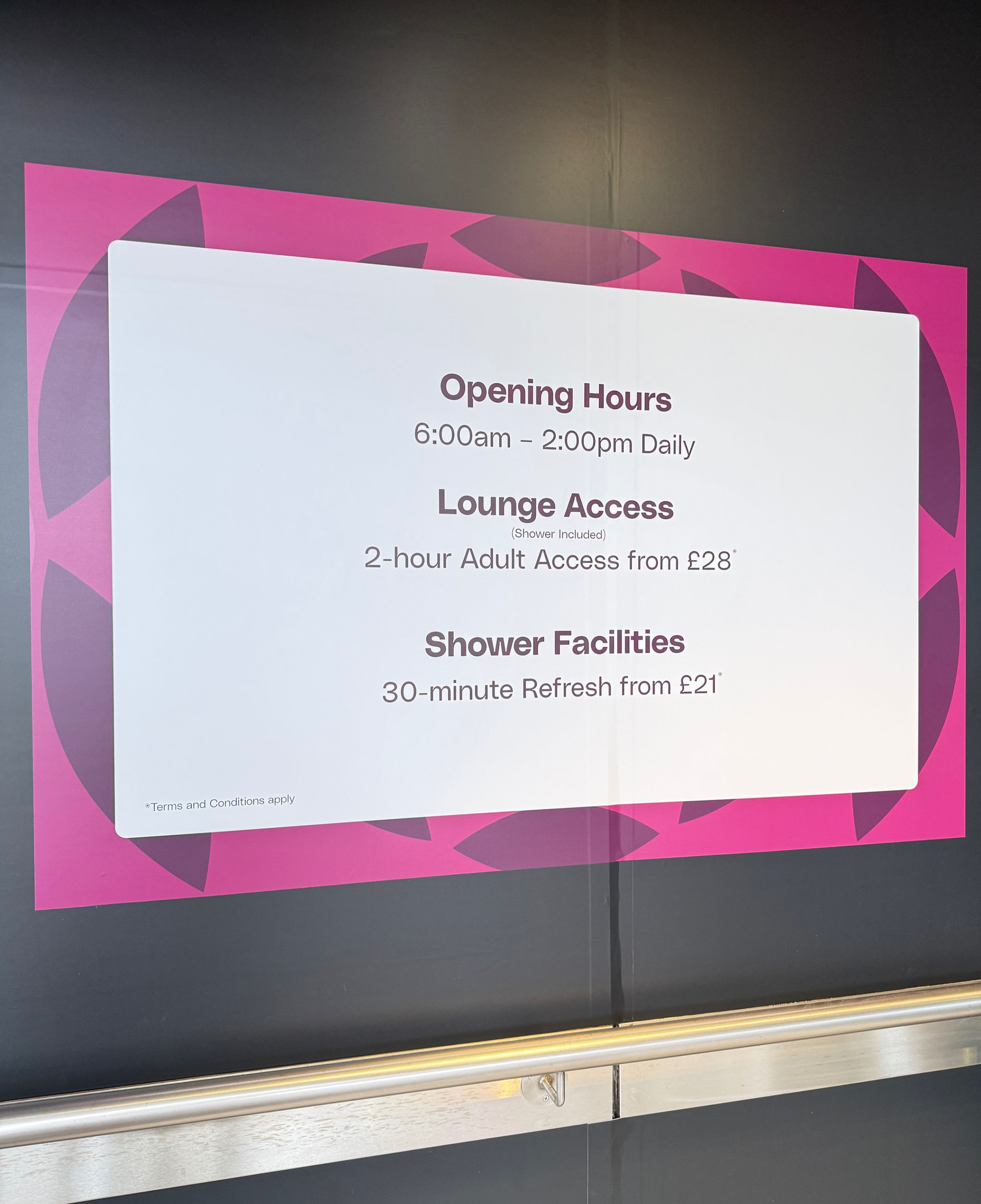 Plaza Premium Arrivals Lounge opening hours sign showing 6 a.m. – 2 p.m. schedule