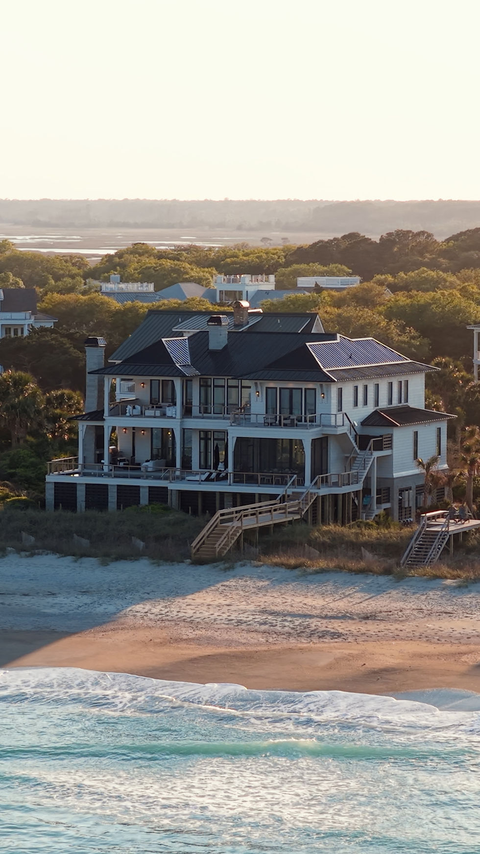 Exterior of luxury beach home designed by Black Sheep Interiors