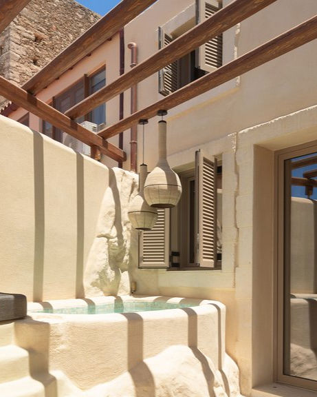 Private terrace with spa and minimalist interiors at Manili Boutique Suites in Crete