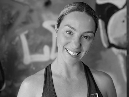 a happy female gym member, girl power