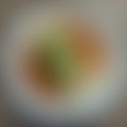 Silken Cantonese steamed tofu sliced and arranged on a plate, topped with soy sauce, ginger, scallions, and sizzling hot oil garnish.