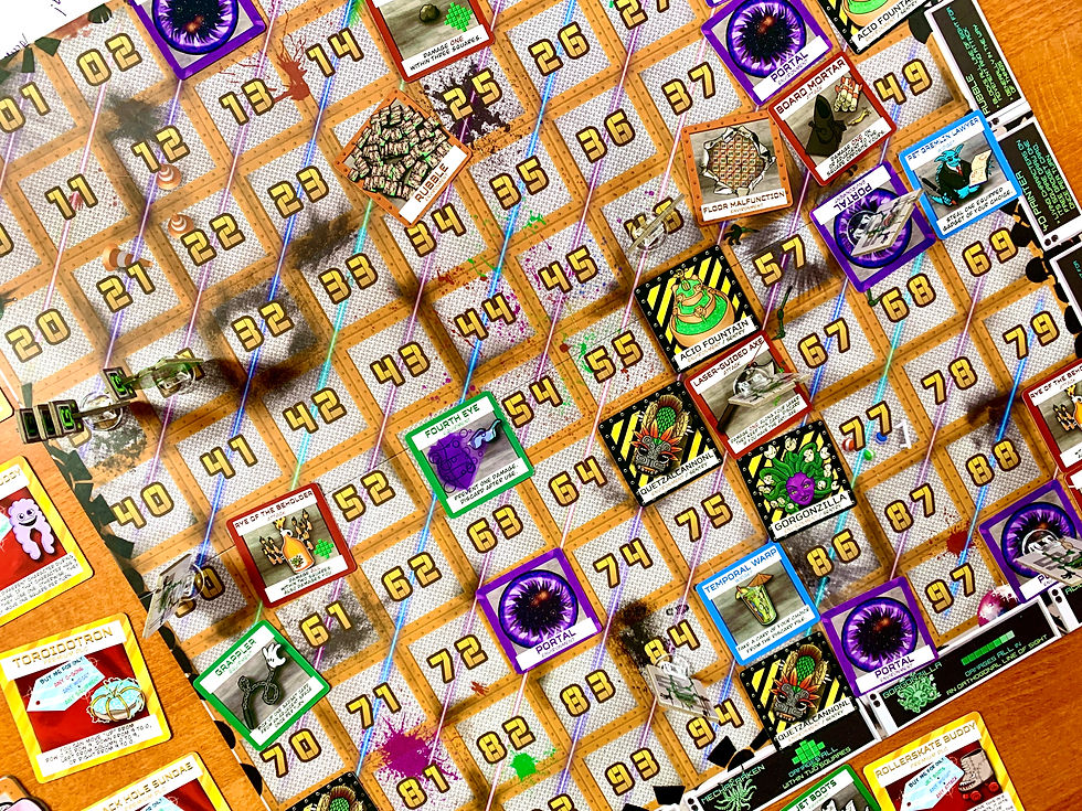 Overhead view of Gadget Grid game board with card and token components in squares mid gameplay